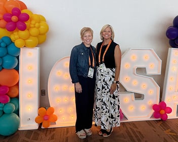 Dr. Angela Robbins and Janet Staderman at a networking event.