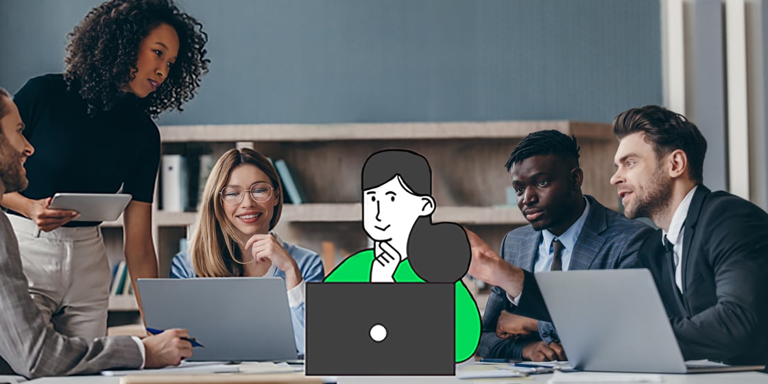 Group of business people working together at an office table.