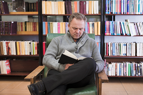 Senior Man Reading a Book-1